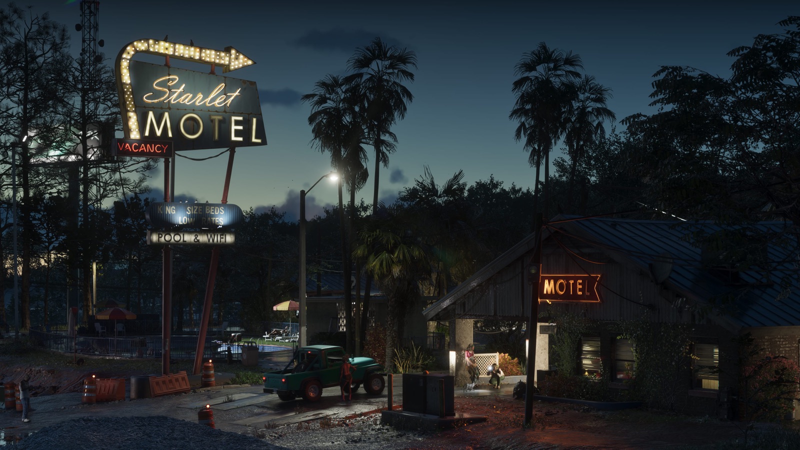 The Starlet Motel sign lit at dusk in Port Gellhorn
