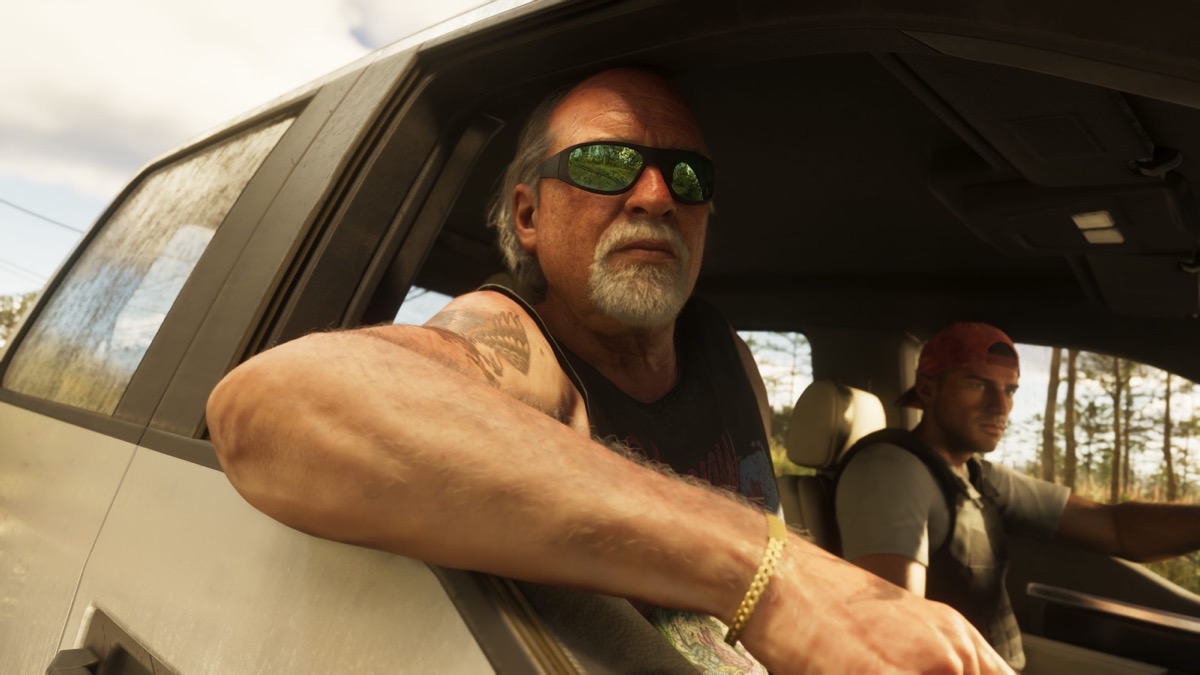 A driver at the window of a parked car